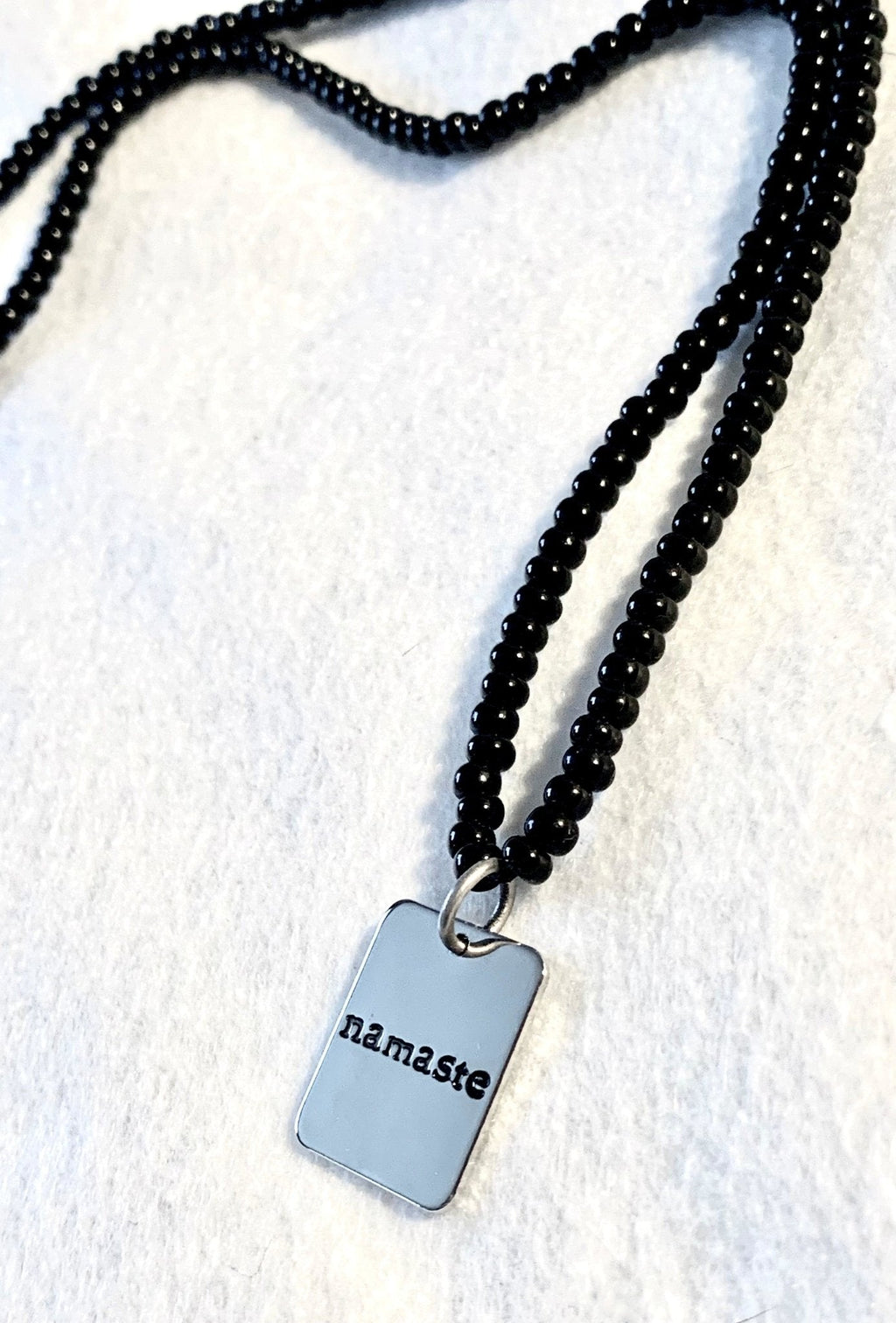 Namaste Handmade Long 30" Black Glass Beaded Necklace (Namaste Charm Pendant)